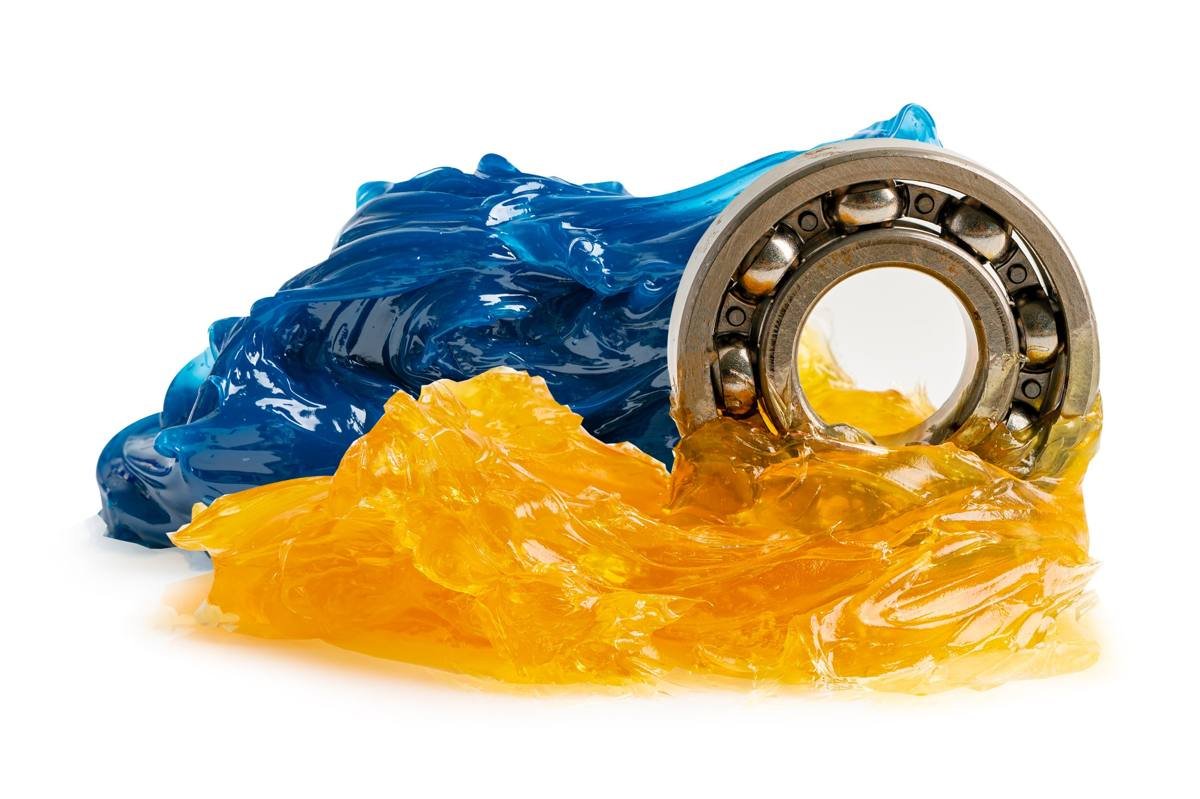 Blue and yellow grease with a ball bearing